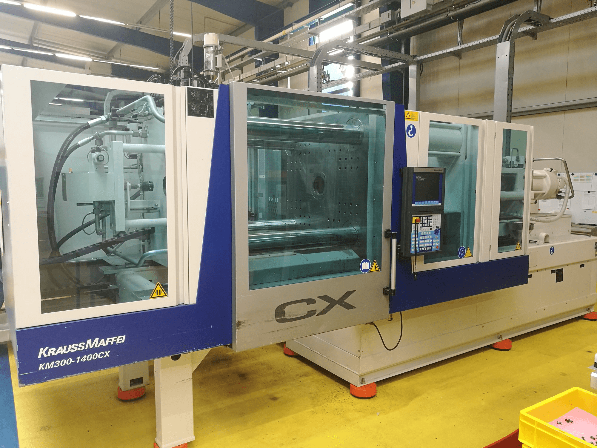 Vista Frontal da Krauss Maffei 300-1400 CX máquina