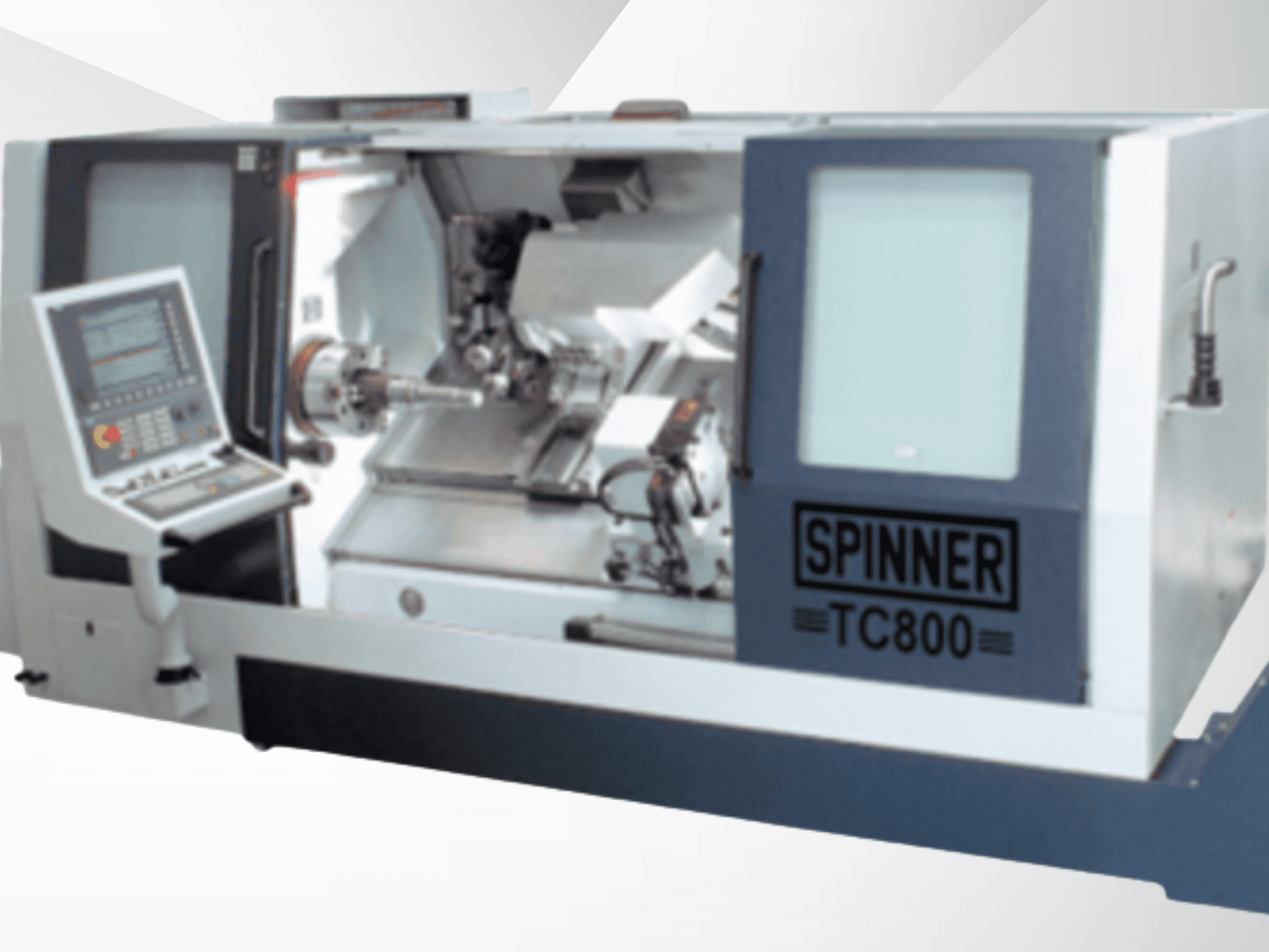 Centro de torneamento e fresagem SPINNER TC800 110MCY, vista frontal que mostra o painel de controlo e o interior da máquina, com o fuso e as ferramentas de corte.