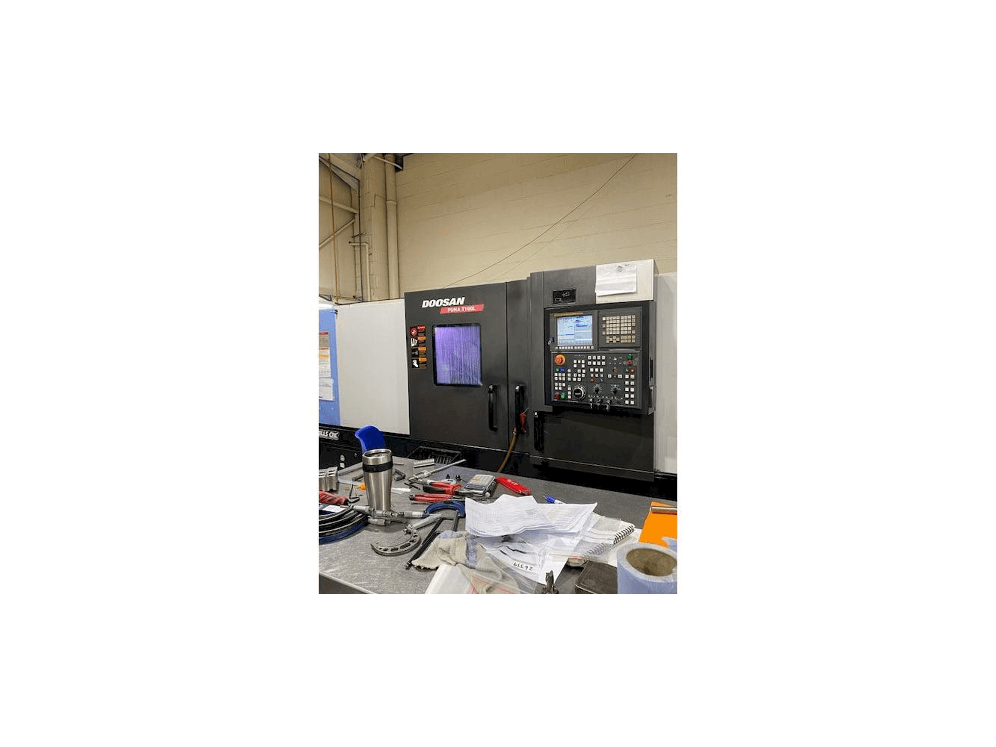 Vista Frontal da Doosan Puma 3100L máquina