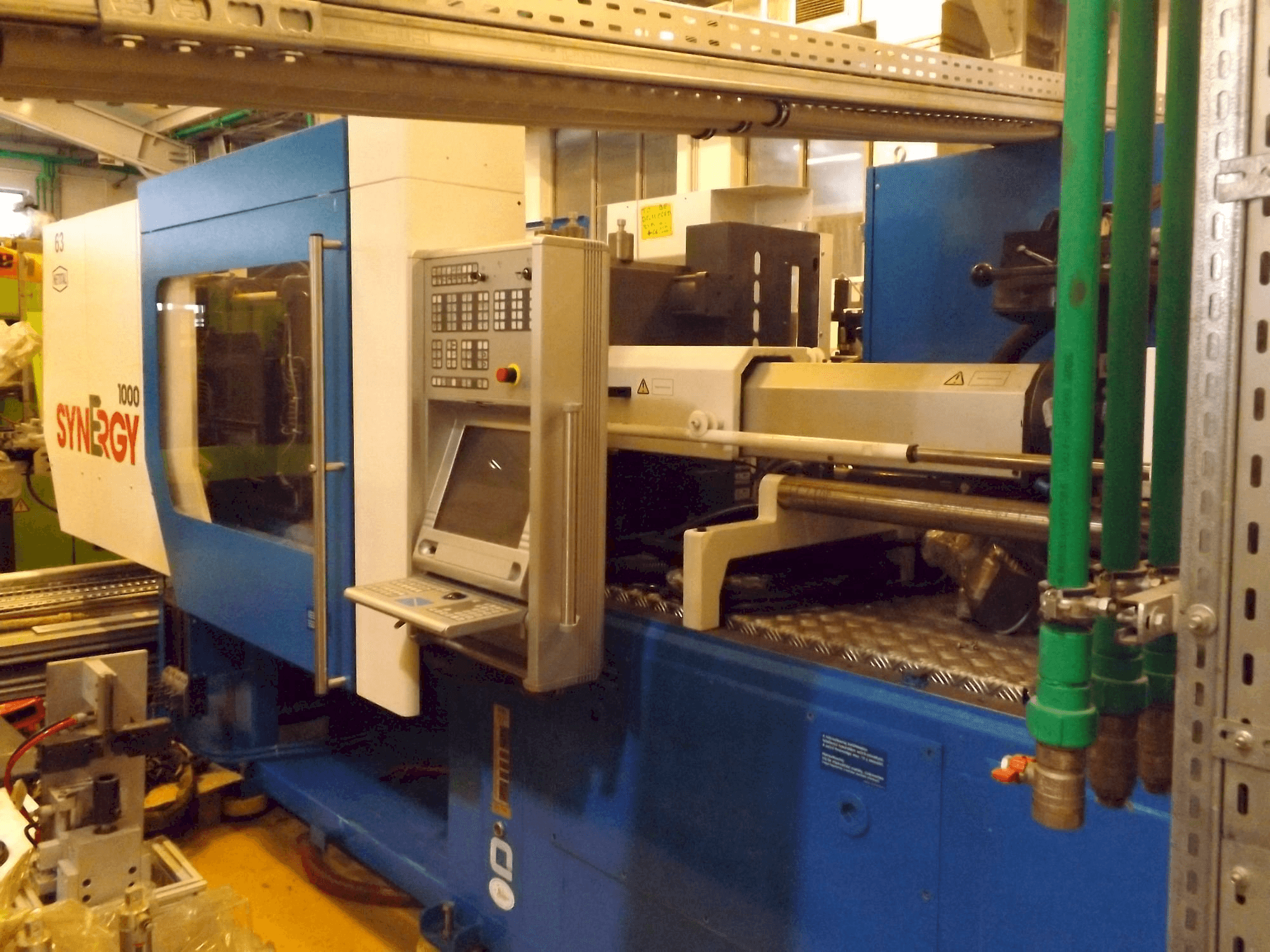 Vista Frontal da Netstal Synergy 1000 230-110 máquina