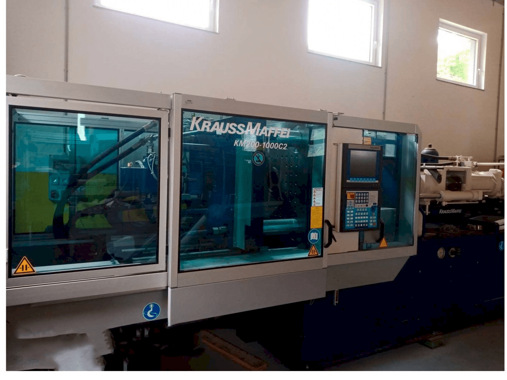 Vista Frontal da Krauss Maffei KM 200/1000 máquina