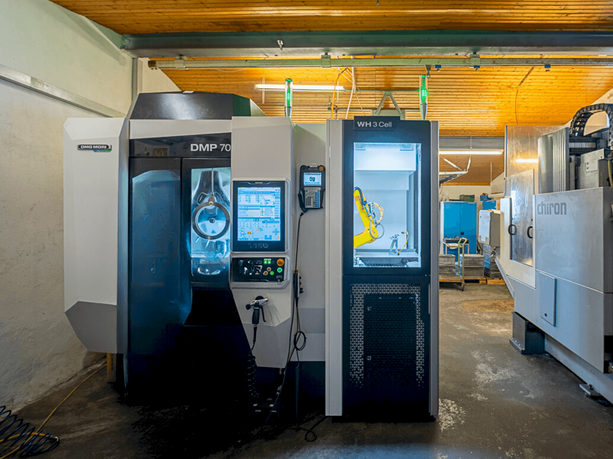 Vista Frontal da DMG MORI DMP 70 with WH3 máquina