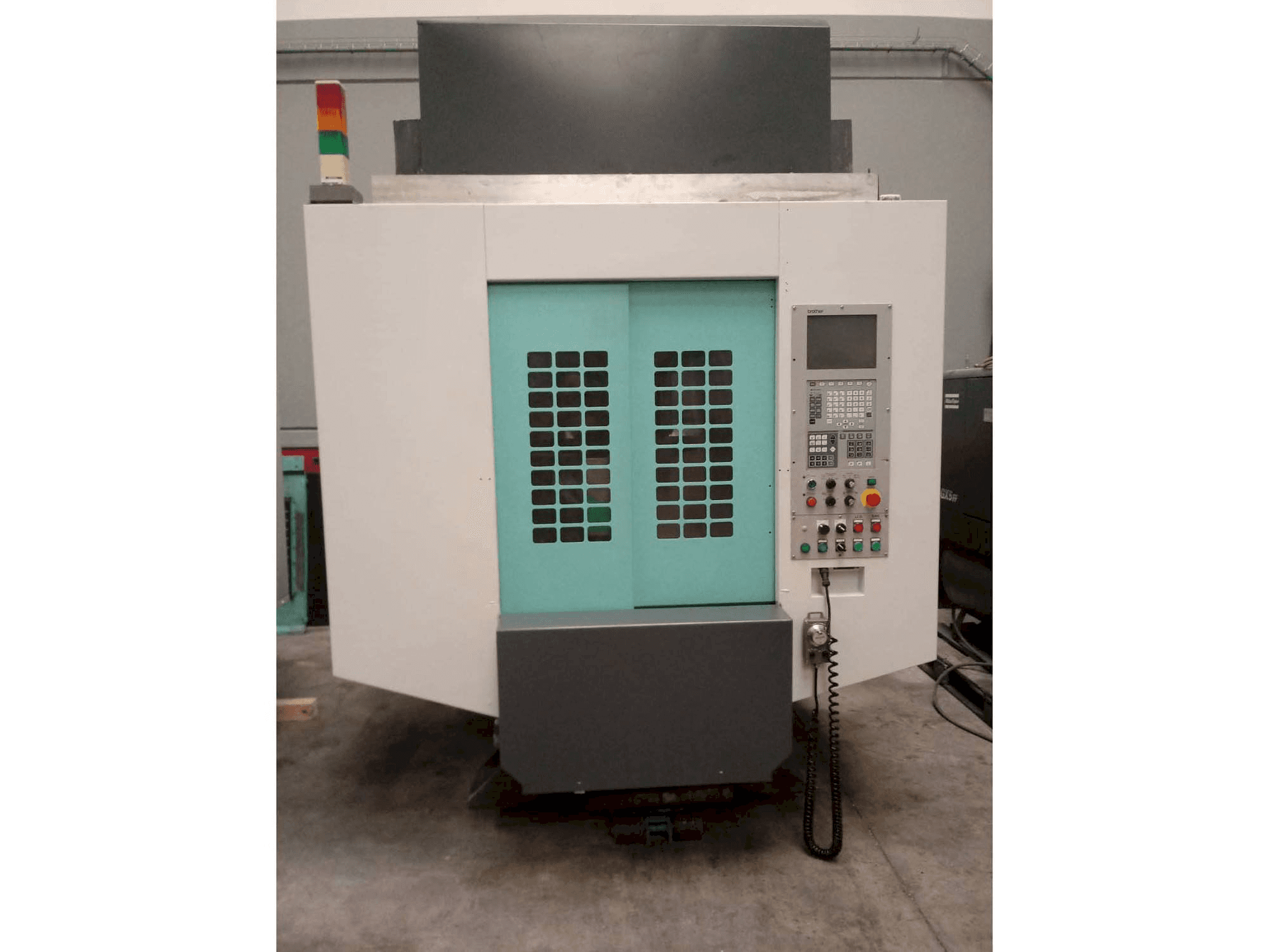 Vista Frontal da Brother TC-S2DN-O máquina