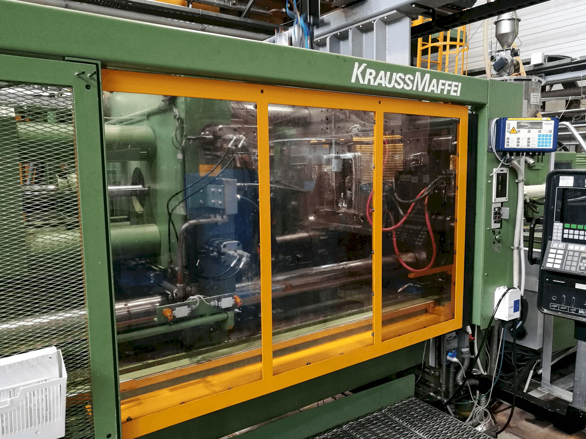 Vista Esquerda da Krauss Maffei 650-2300 B2 máquina