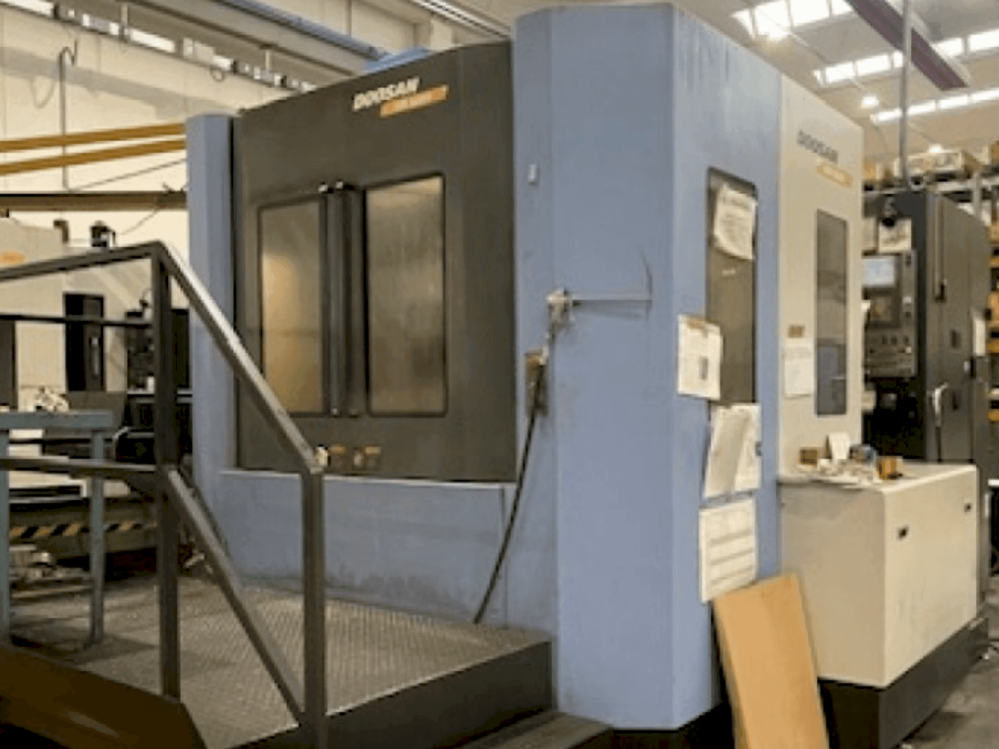 Vista Frontal da DOOSAN HM 6300 (2009) máquina