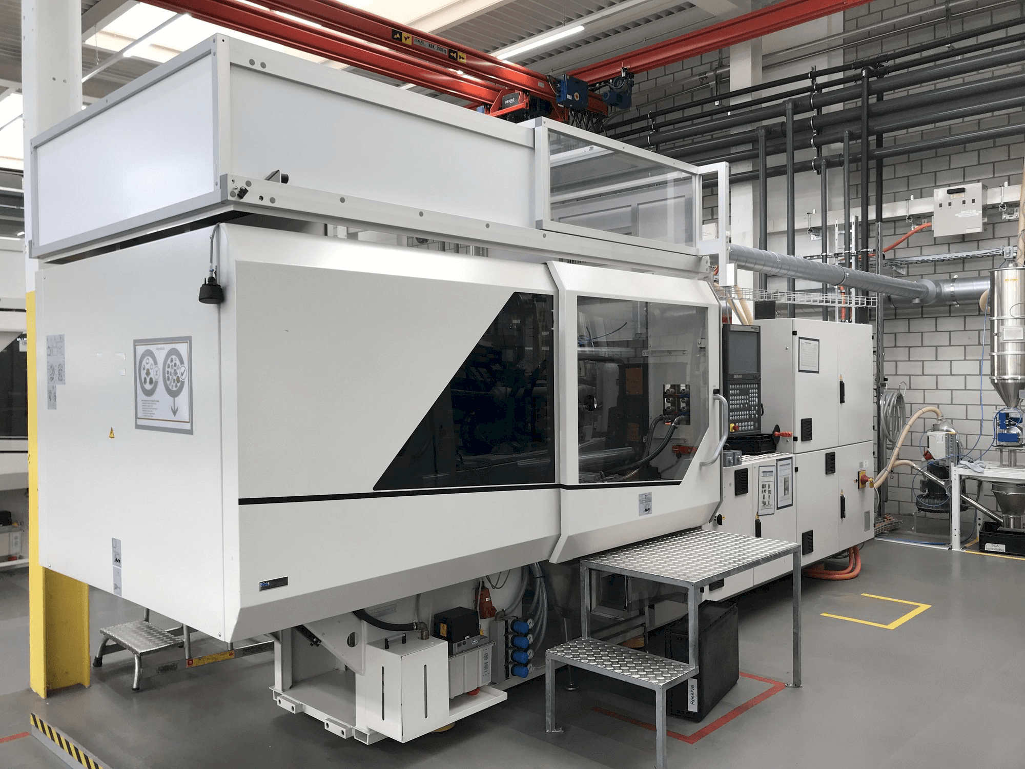 Vista Lateral Esquerda da Sumitomo Demag EL-EXIS SP 150/500-475 máquina