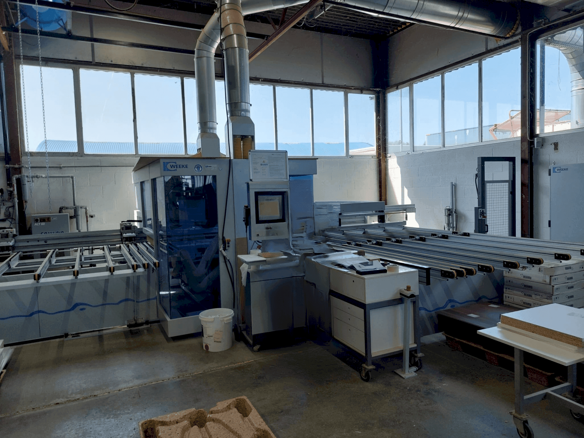 Vista Frontal da Weeke Optimat BHX 500/D máquina