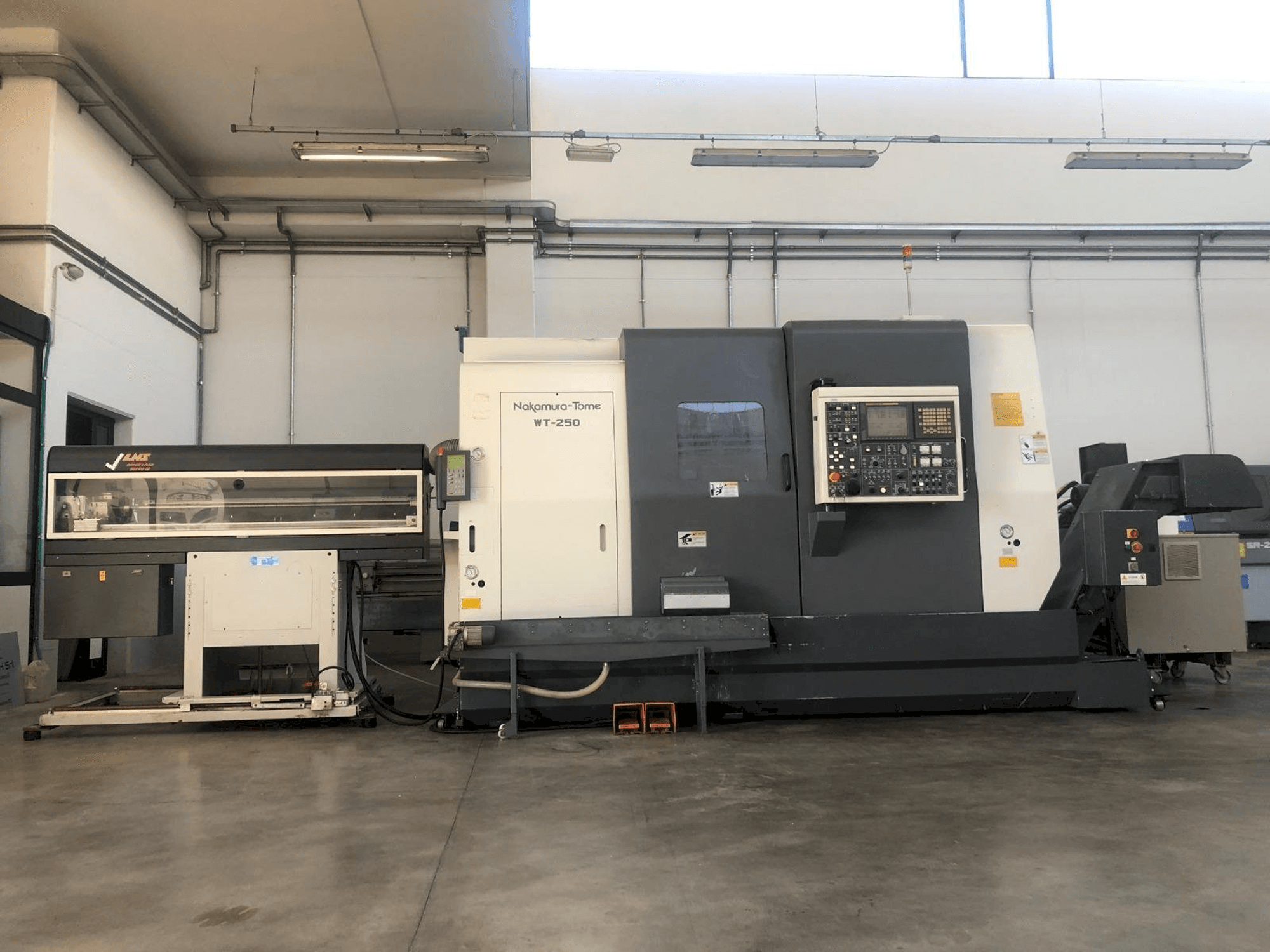 Vista Frontal da NAKAMURA-TOME WT-250 MMY máquina