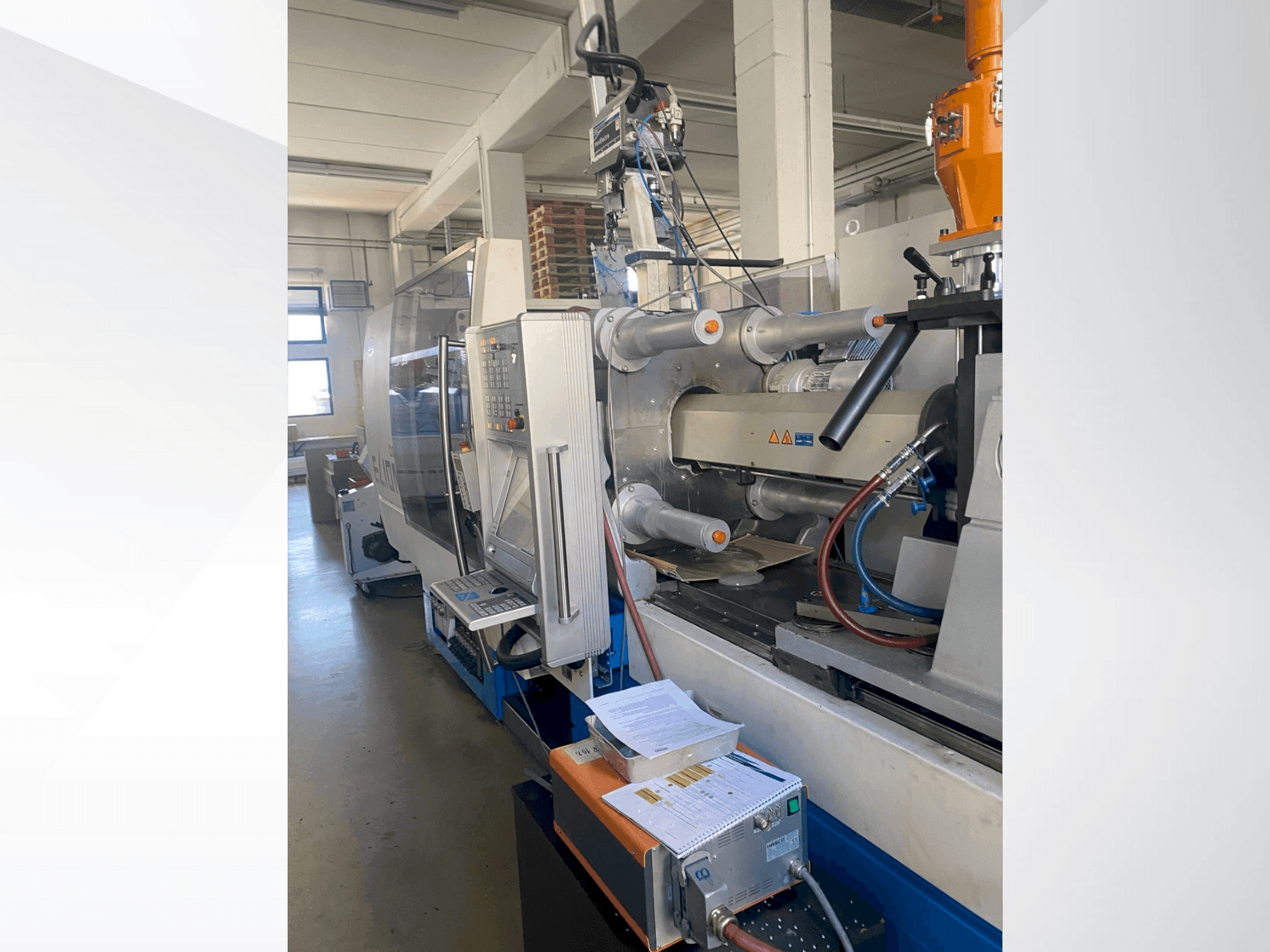 Vista Frontal da Netstal ELION 1200-530 PM máquina