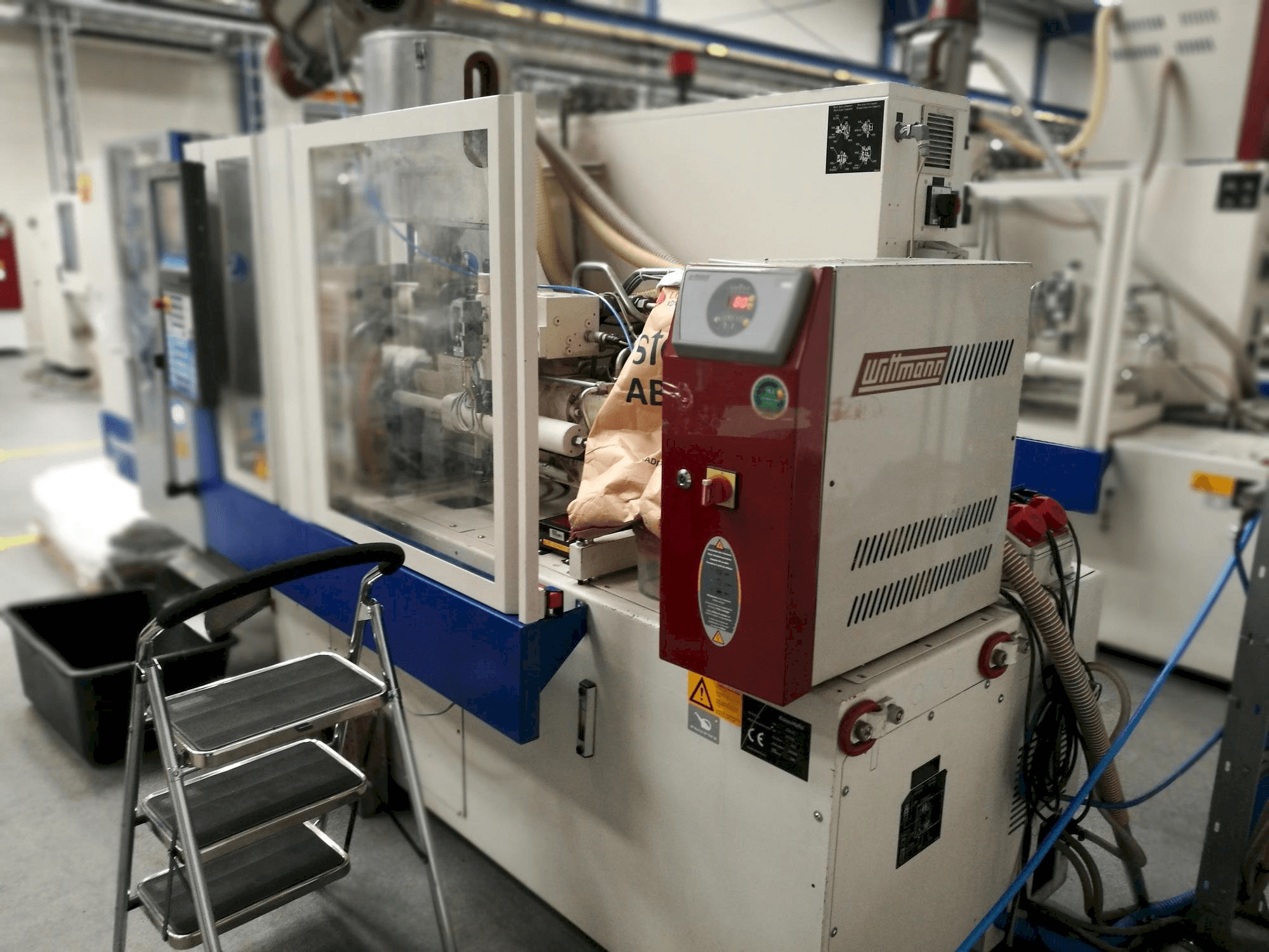 Vista Frontal da Krauss Maffei KM 35-55 CX máquina