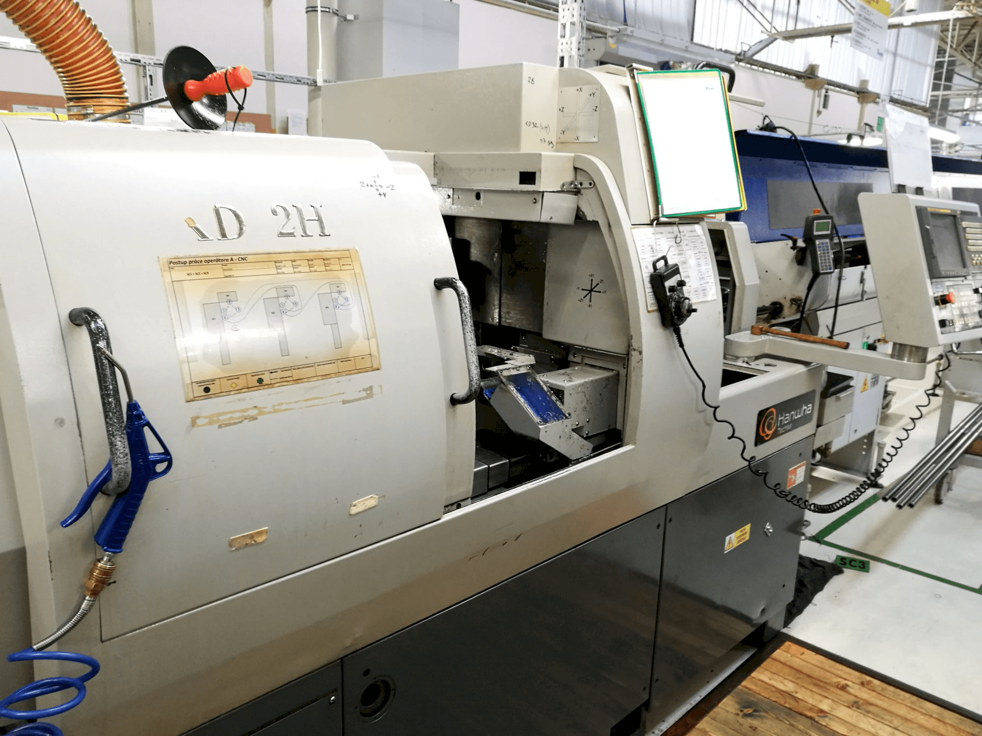 Vista Direita da Hanwha XD 32 H máquina