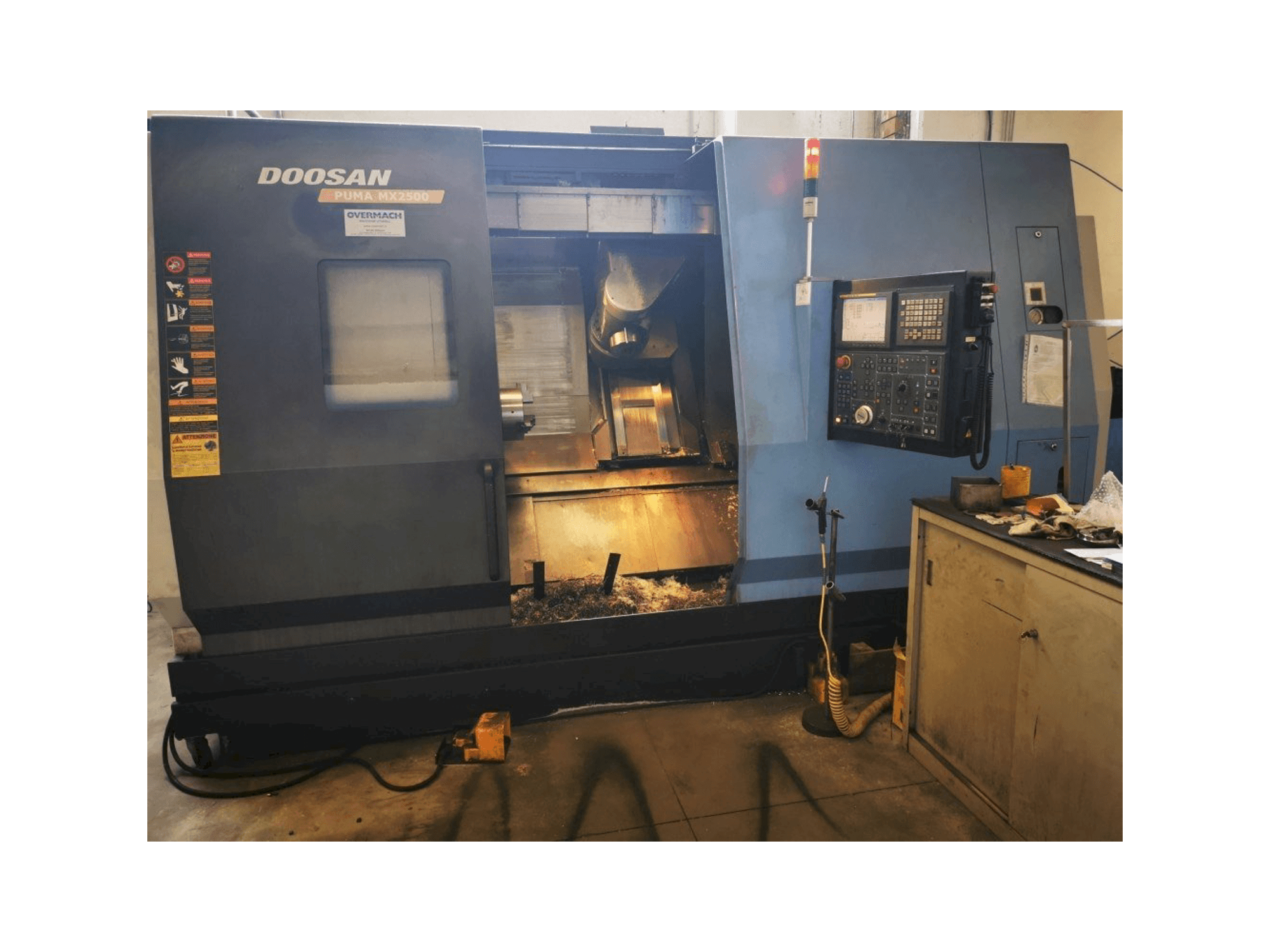 Vista Frontal da Doosan Puma MX 2500 máquina
