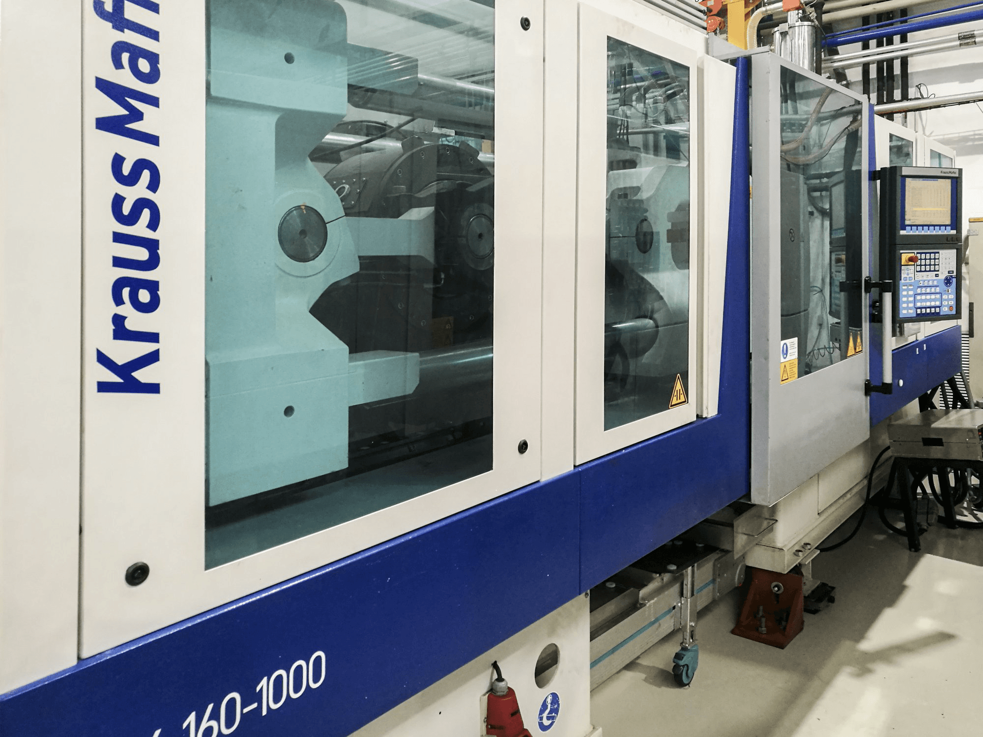 Vista Esquerda da Krauss Maffei 160-1000 EX máquina