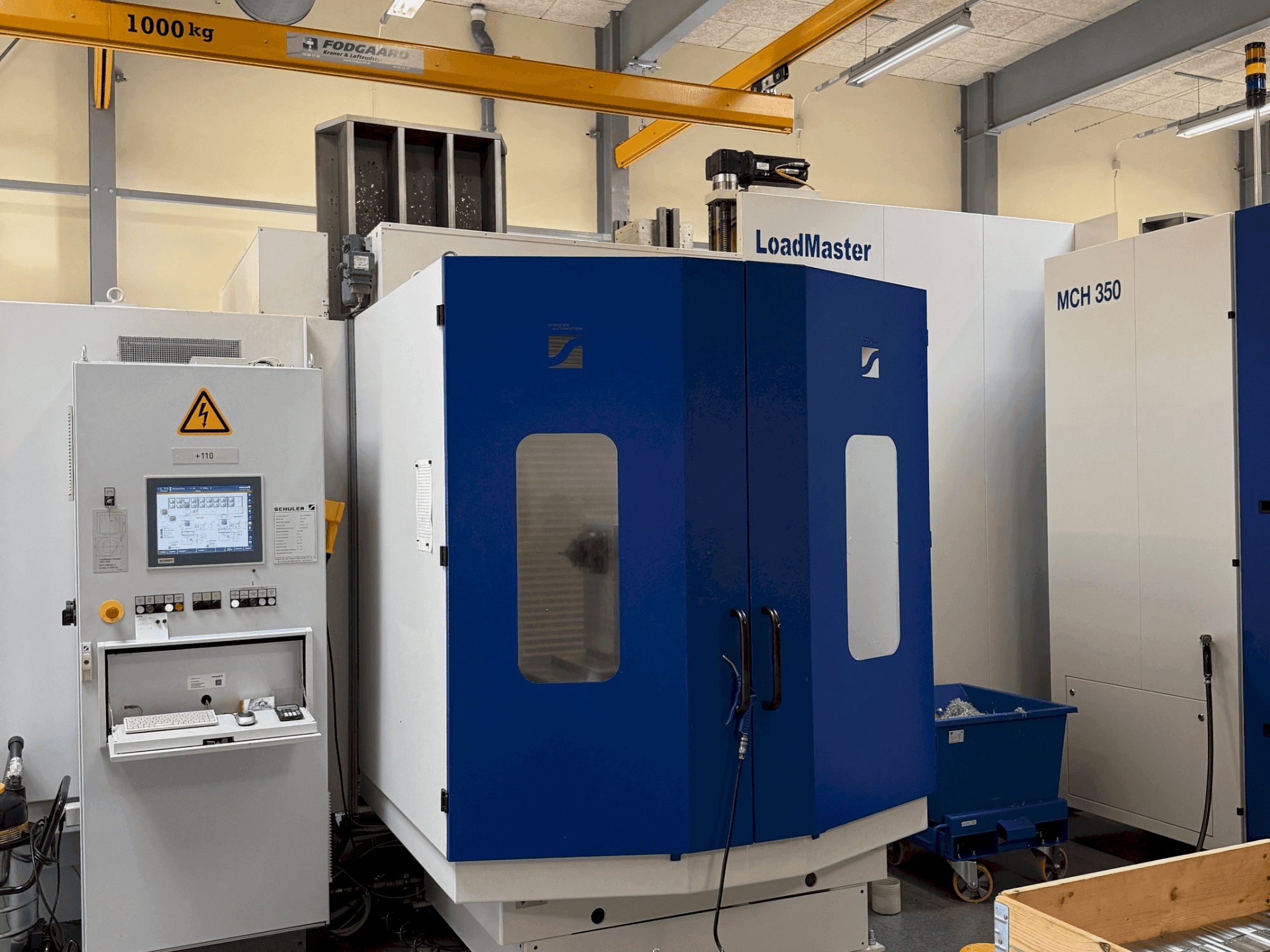 Vista Frontal da HELLER MCH 300 + MCH 300 C + 22 pallet system máquina