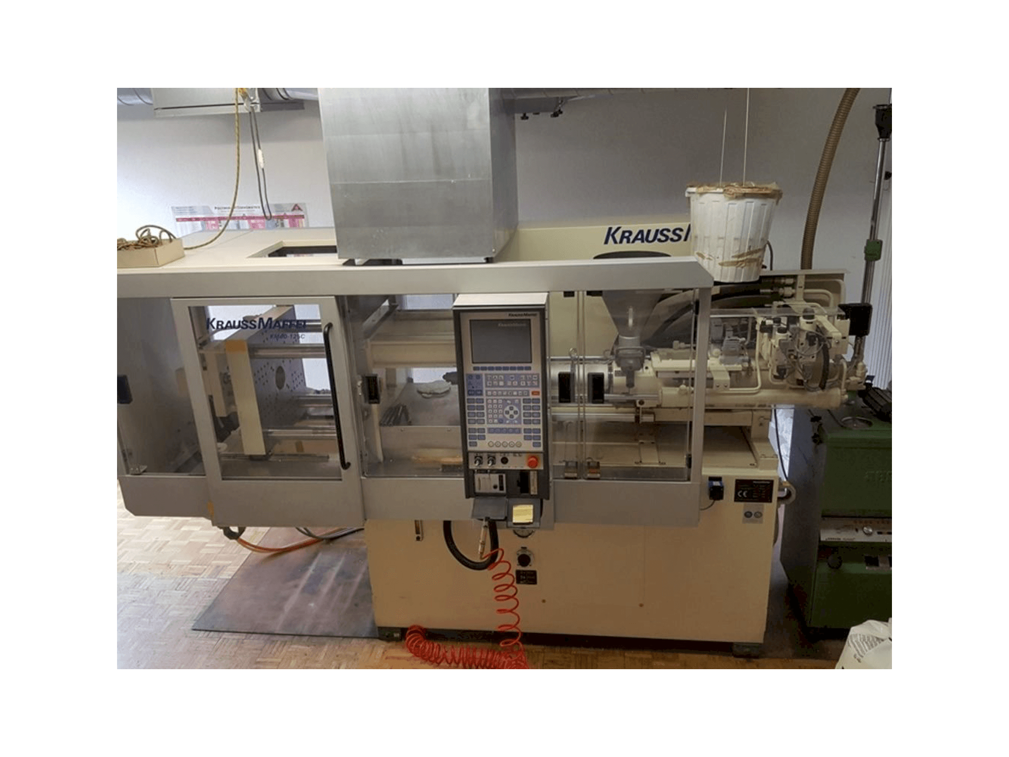 Vista Frontal da Krauss Maffei 40-125 C Winner máquina