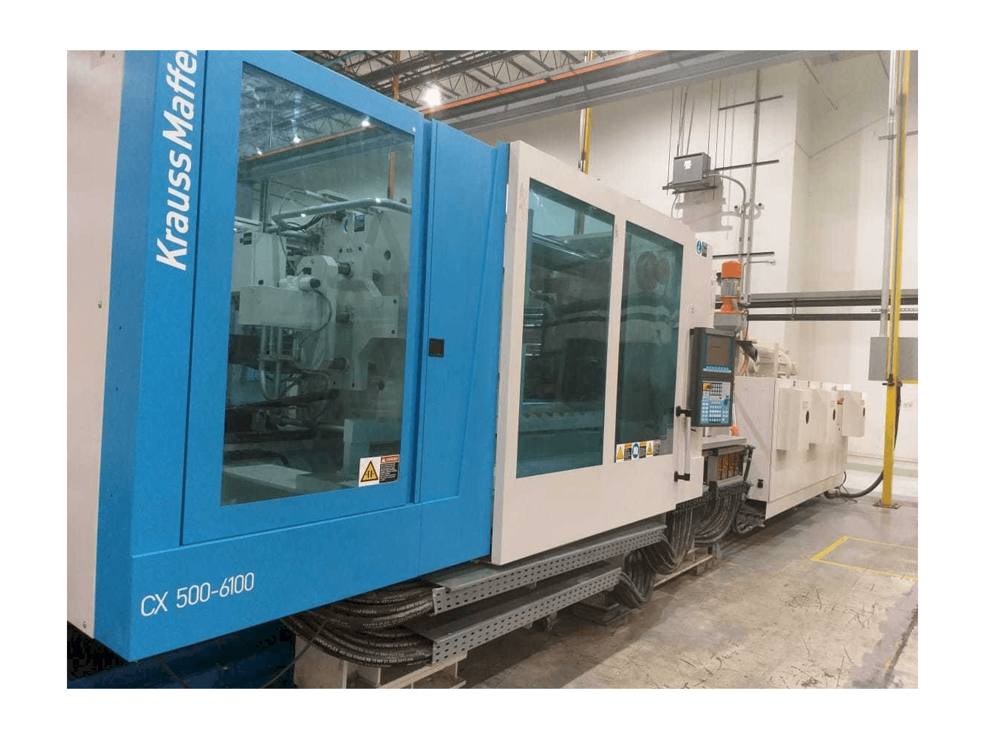 Vista Frontal da Krauss Maffei 500-6100 CX máquina